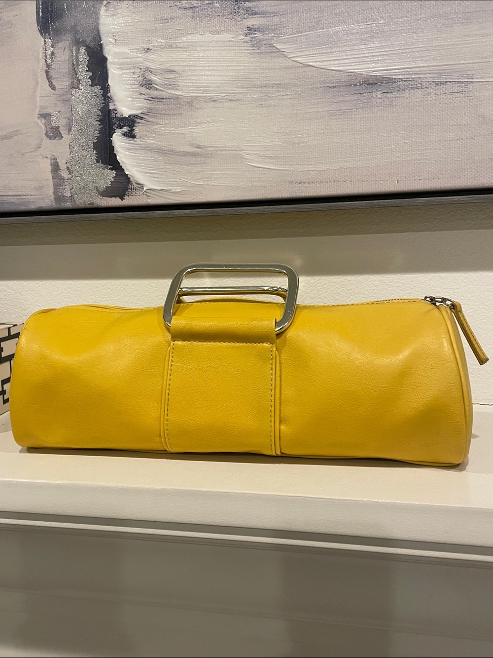 Sleek Yellow Barrel Clutch bag with Metal Handle by Aldo